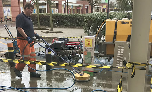 Rotary pressure cleaning equiment for cleaning paved areas